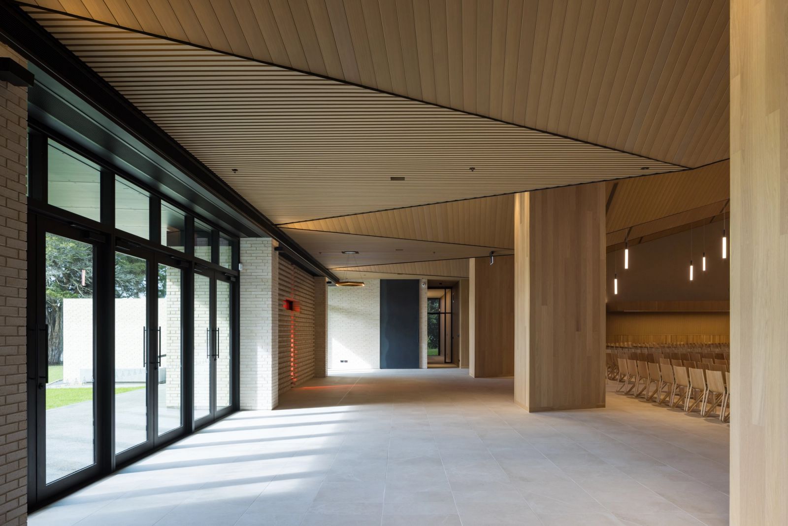 Slatted InnoCeil ceiling running through the chapel foyer